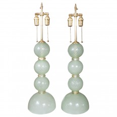 Pair of pale green ball form Murano glass lamps 